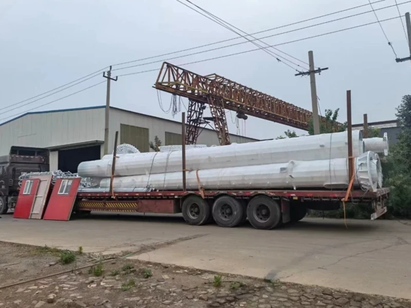 Galvanized tower sections loaded on a truck for shipment