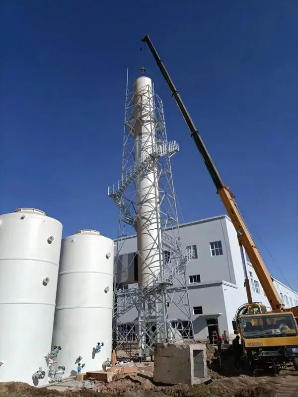 Crane lifting a steel stack into a chimney support tower