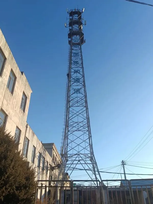 Urban communication tower with sector panel antennas and several working platforms