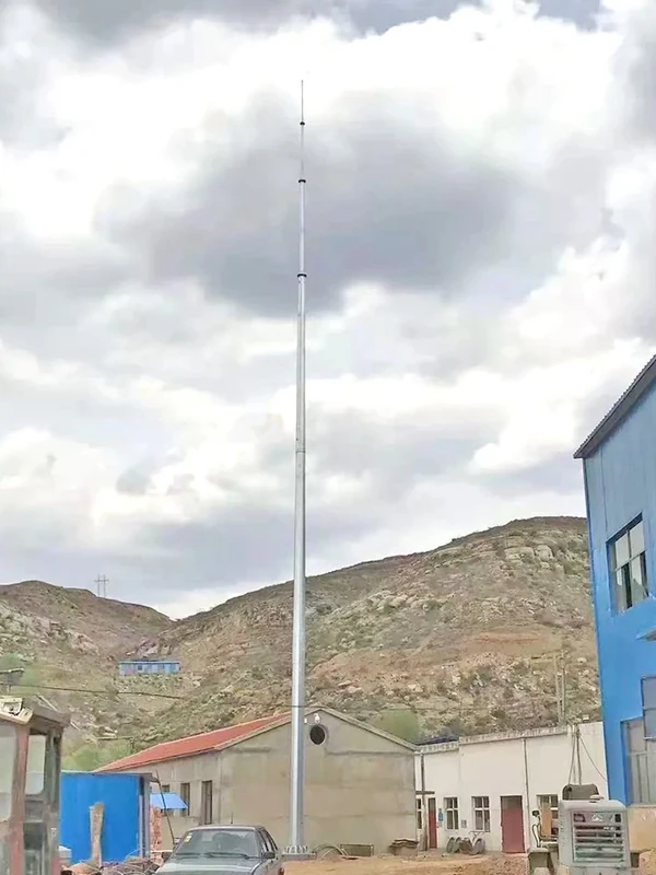 Galvanized monopole lightning mast at a mountain facility
